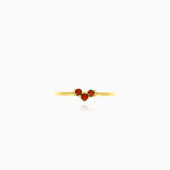 Yellow gold ring with three garnets