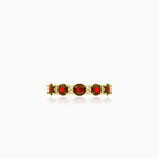 Stylish yellow gold ring with garnet and cubic zirconia