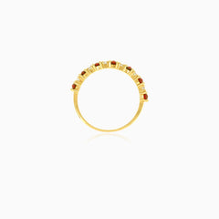 Classic yellow gold ring with garnet and cubic zirconia