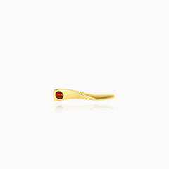 Gold ring with round cut garnet