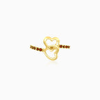 Gold ring with two hearts and garnet