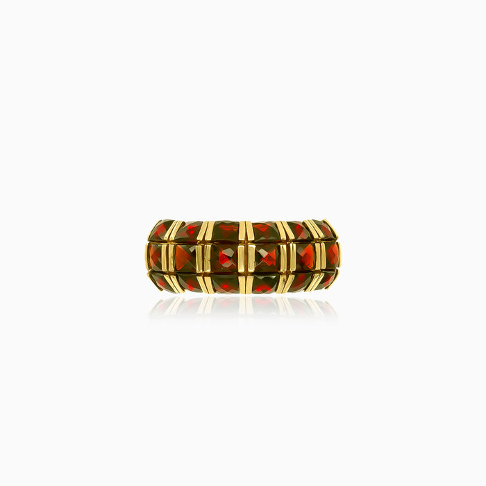 Anillo de oro amarillo con granates y estilo