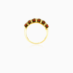 Stylish yellow gold ring with garnets