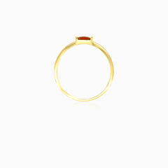 Yellow gold simple ring with radiant cut garnet