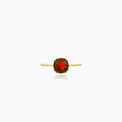 Solitaire garnet ring in yellow gold