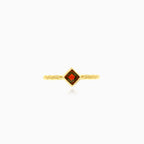 Simple yellow gold ring with solitaire garnet