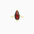 Simple pear cut garnet yellow gold ring