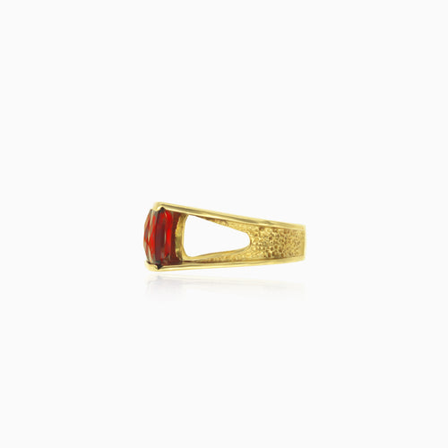 Yellow gold ring with radiant cut garnets