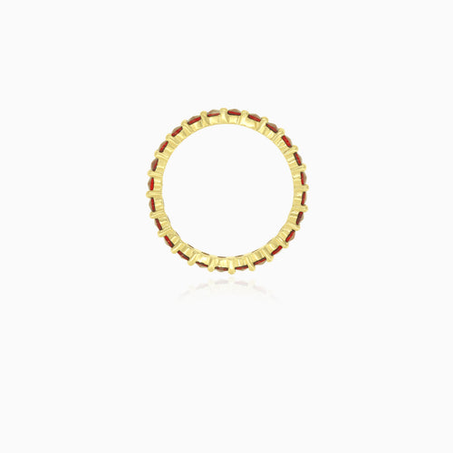 Yellow gold ring with eternity garnets