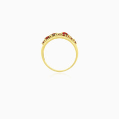 Yellow gold ring with pear and round garnets