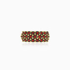 Yellow gold ring with three rows of garnets