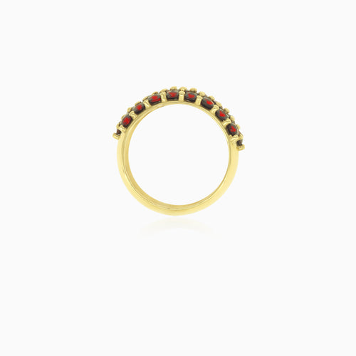 Yellow gold ring with three rows of garnets