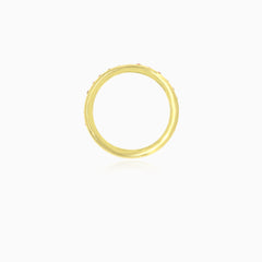 Yellow gold ring with eternity garnets in bezel set