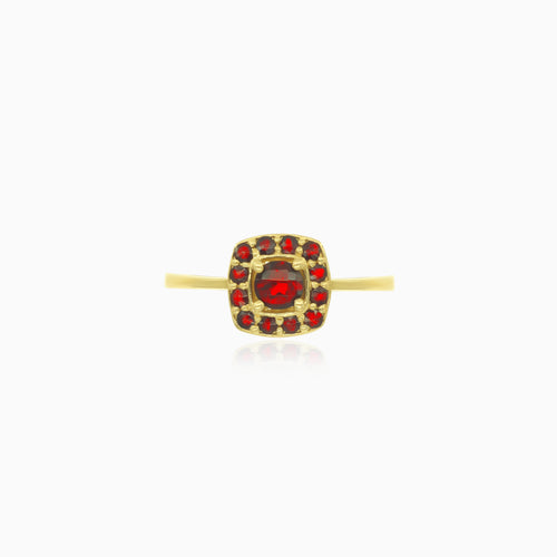 Yellow gold ring with round garnet