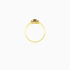 Yellow gold ring with round garnet