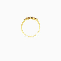 Yellow gold ring with marquise cut garnet