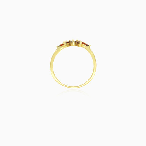 Yellow gold ring with marquise cut garnet