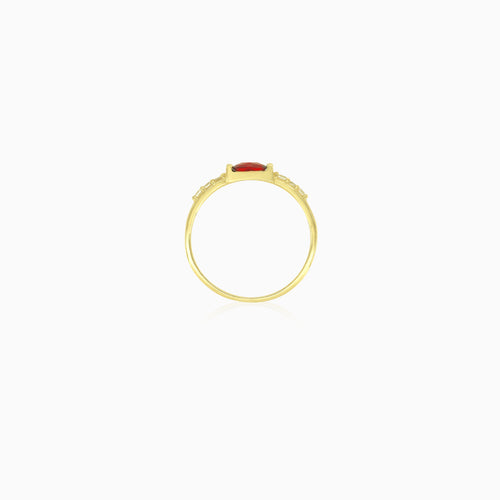 Garnet and cubic zirconia ring in yellow gold