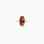 Garnet oval cut gold ring on bar set