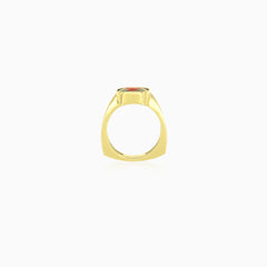 Yellow gold garnet ring with cushion and radiant cuts