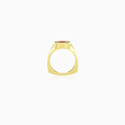 Yellow gold garnet ring with cushion and radiant cuts