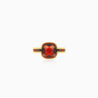 Yellow gold garnet ring with cushion and radiant cuts