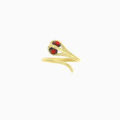 Yellow gold snake ring with garnets