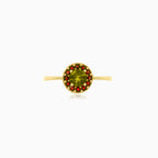 Yellow gold ring with round moldavite and garnets