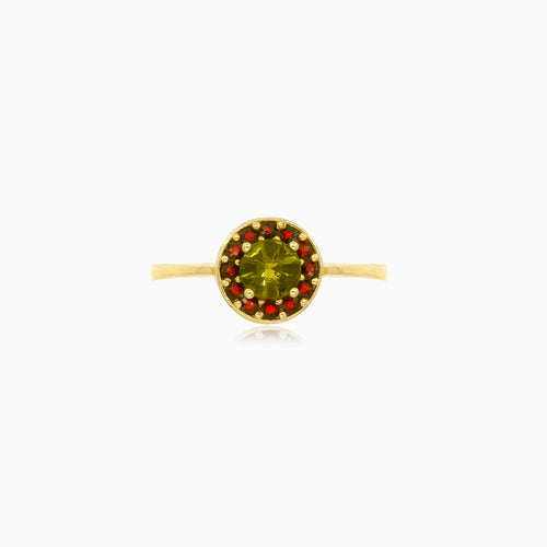 Yellow gold ring with round moldavite and garnets