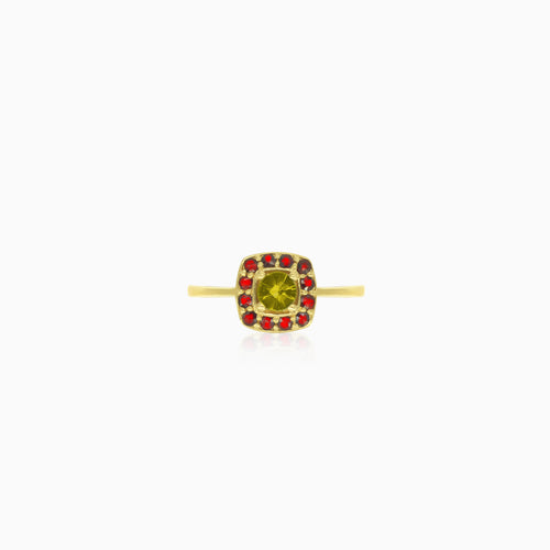 Yellow gold ring with round moldavite and garnet