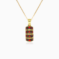 Yellow gold pendant with three rows of garnets