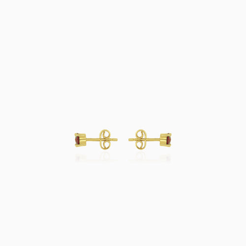 Yellow gold stud earrings with round garnet