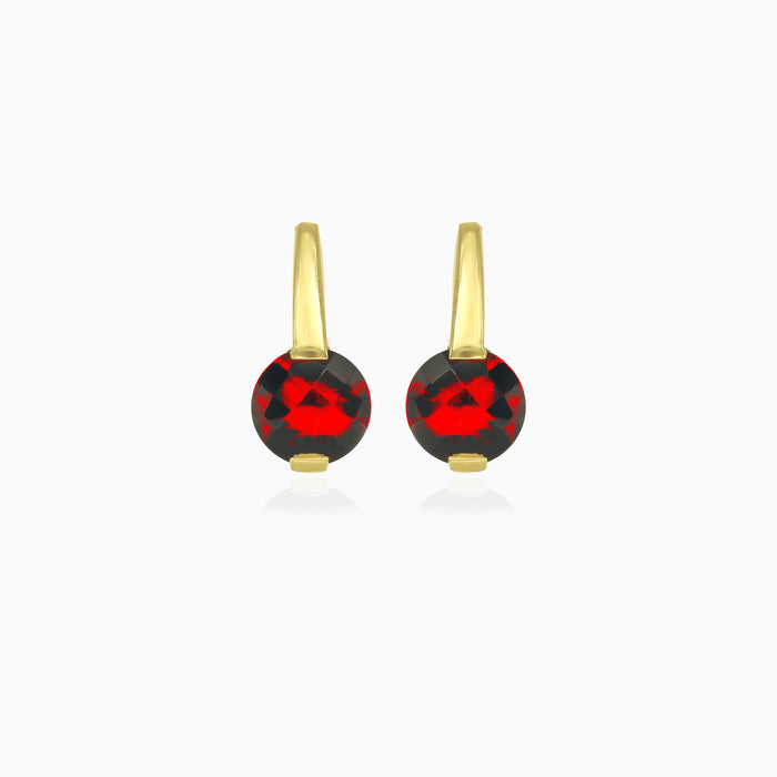 Pendientes solitario de granate talla redonda en oro amarillo
