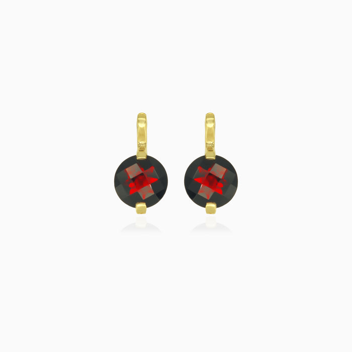 Pendientes solitario de granate talla redonda en oro amarillo