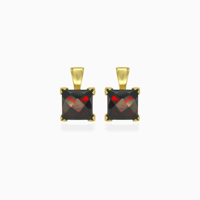 Pendientes de oro amarillo con granate solitario talla princesa