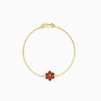 Garnet flower bracelet in yellow gold