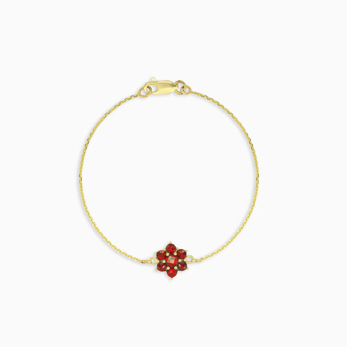 Garnet flower bracelet in yellow gold