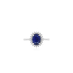 Halo oval cut sapphire on sterling silver ring