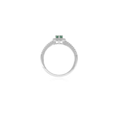 Sterling silver halo ring with pear emerald