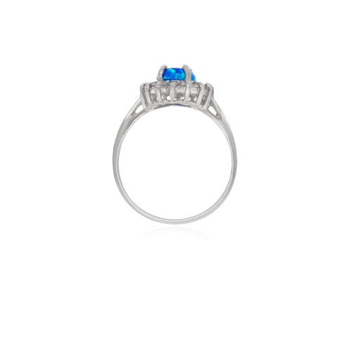 Sterling silver halo ring with blue opal