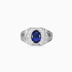 Silver halo ring with sapphire center