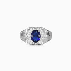 Silver halo ring with sapphire center
