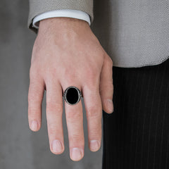 Silver men ring with dark onyx center