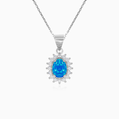 Sterling silver halo pendant with blue opal