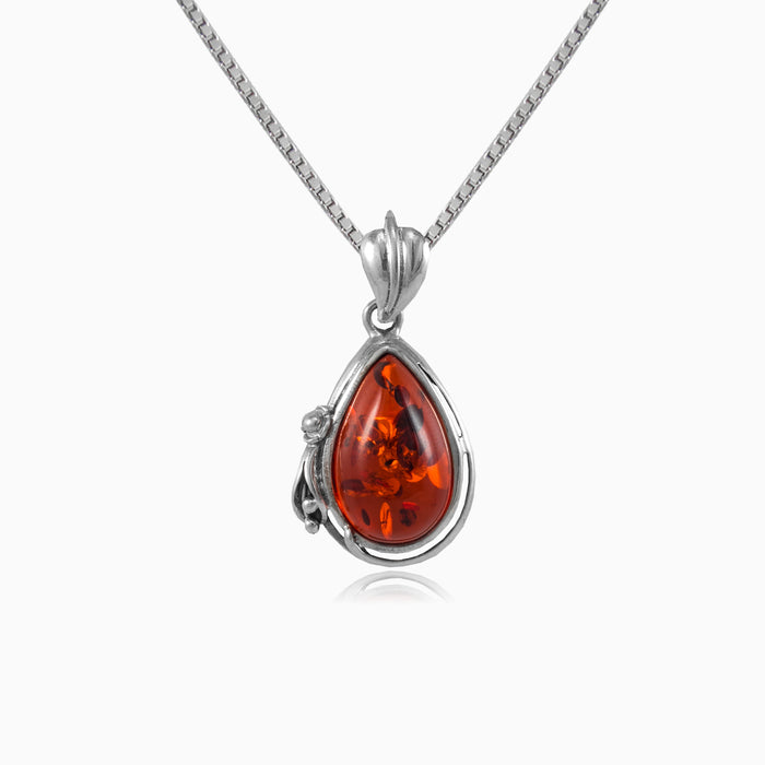 Sterling silver pendant with amber