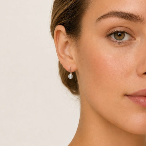 Silver drop flower earrings with round cubic zirconia