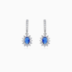 Halo silver dangling earrings with synthetic sapphire