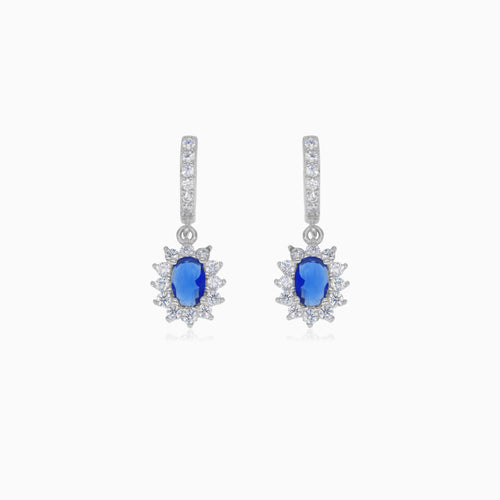 Halo silver dangling earrings with synthetic sapphire