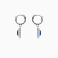 Halo silver dangling earrings with synthetic sapphire