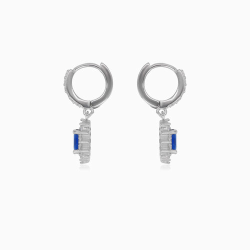 Halo silver dangling earrings with synthetic sapphire